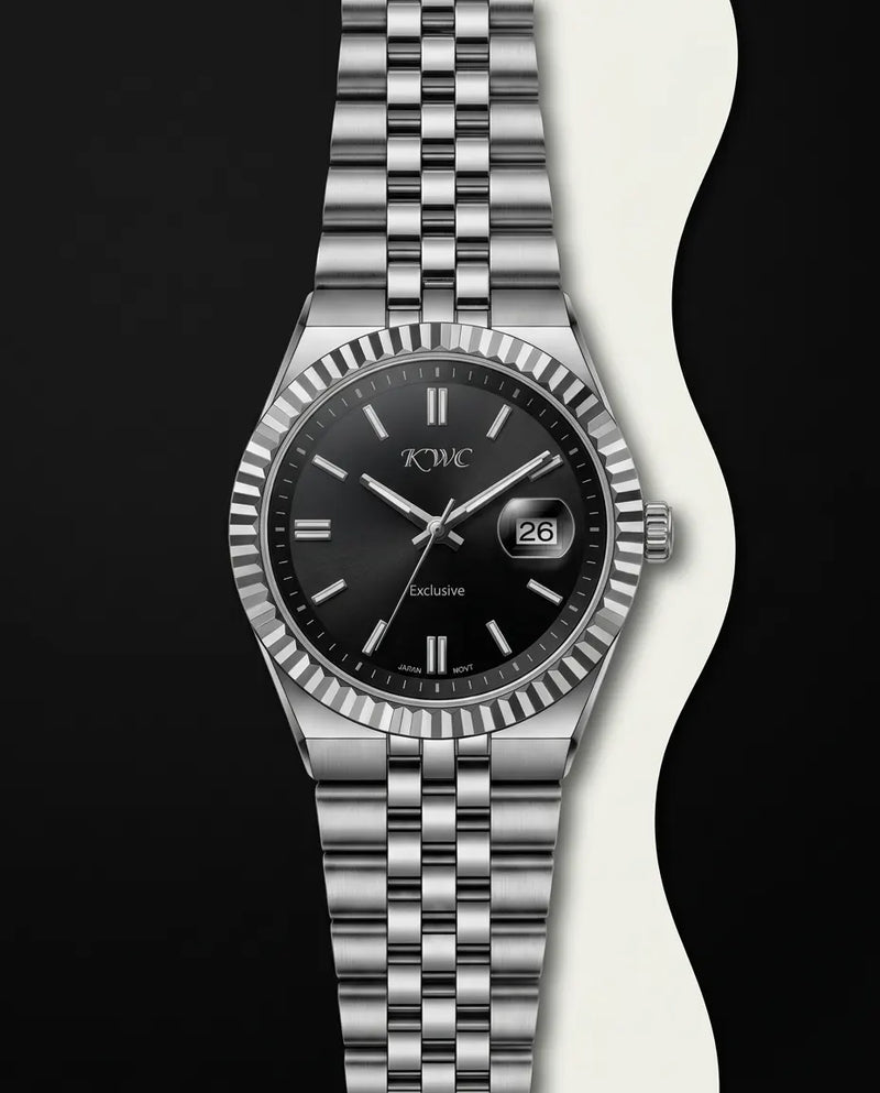 KWC K-320 steel bracelet watch with a black dial and fluted bezel